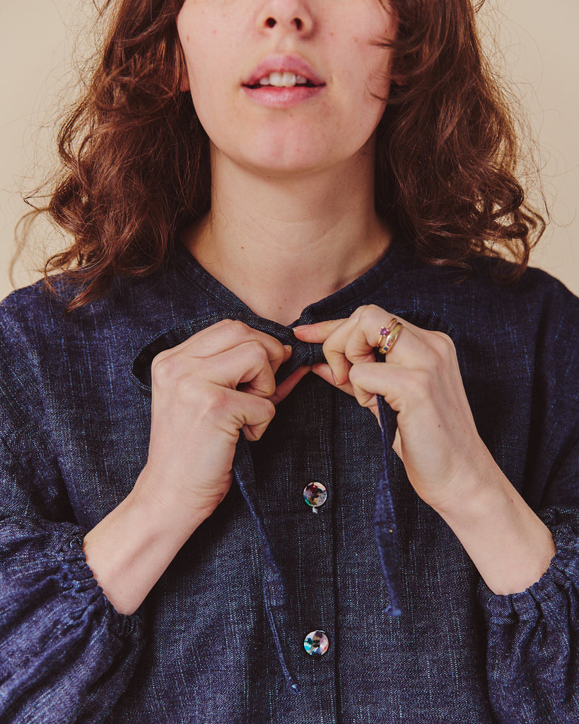 Oversized deadstock denim shirt with neck tie, buttons and elasticated cuffs made to order in the uk